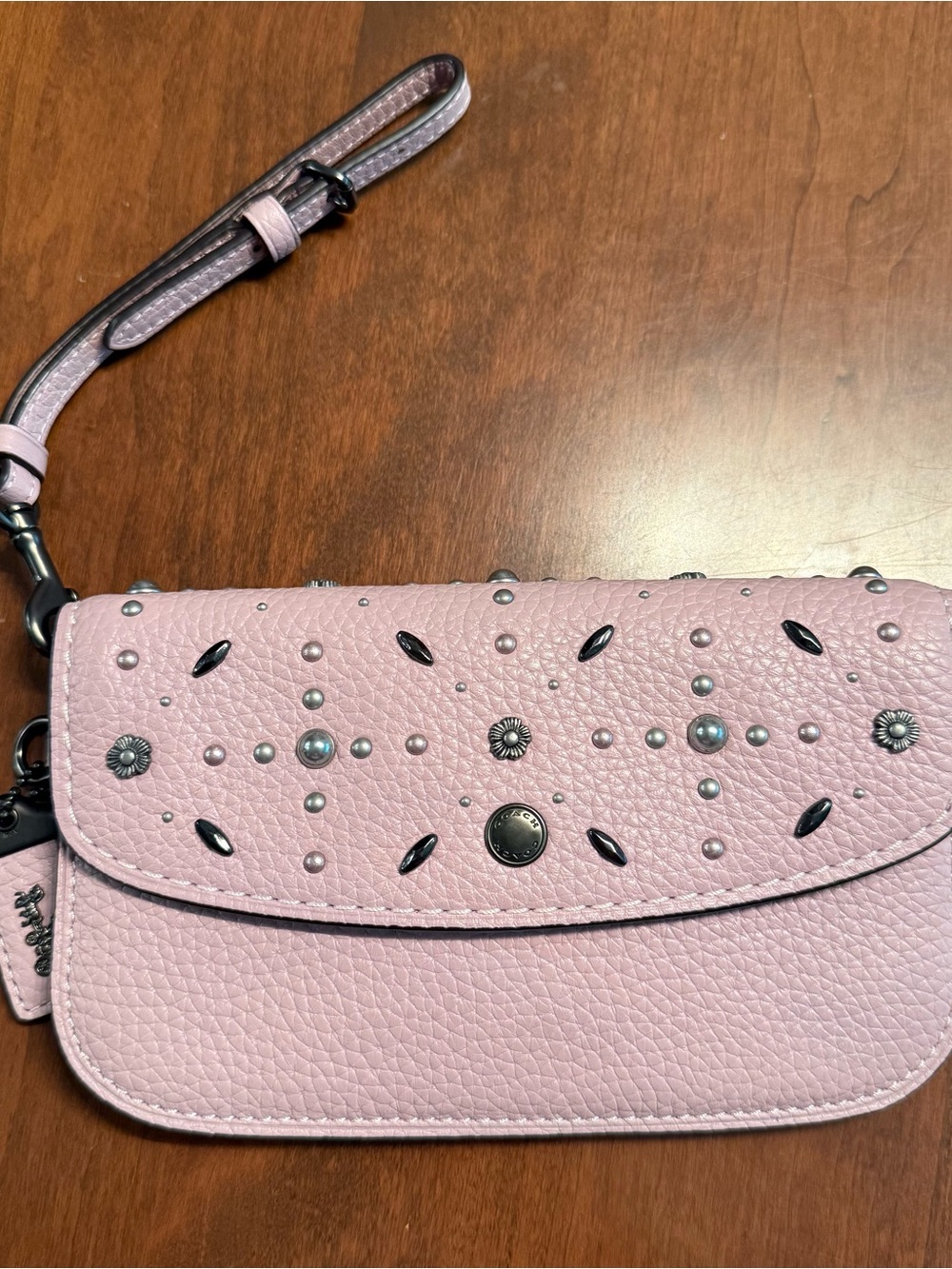 Coach Pink Studded Pebbled Leather Wristlet